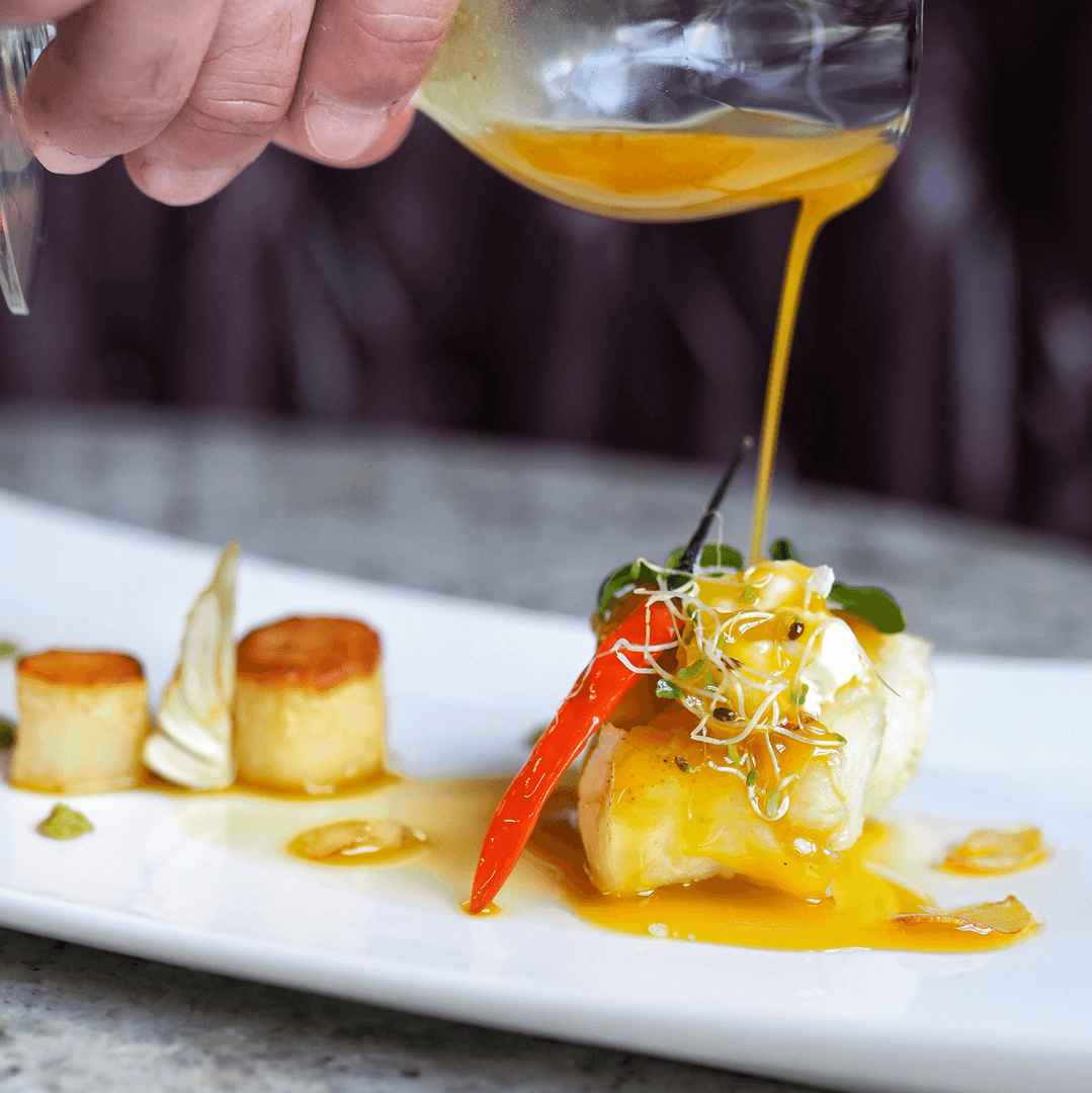 Upcoming Events Vinia - Dish being plated